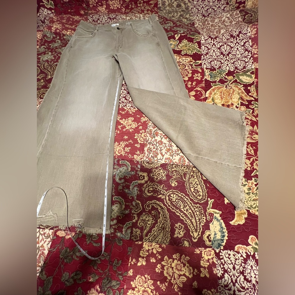 Pilcro / Anthropologie Washed Tan Flares with a distressed raw hem, size 31